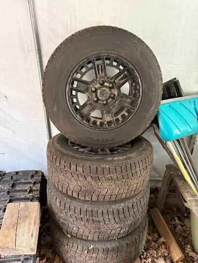 275/65R18 Toyo Winter tires and rims. Not winter rims but nice black rims. See picture. Bought brand...