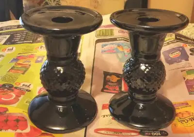 A PAIR VINTAGE CERAMIC BLACK GLAZED CANDLE STICKS, View more
