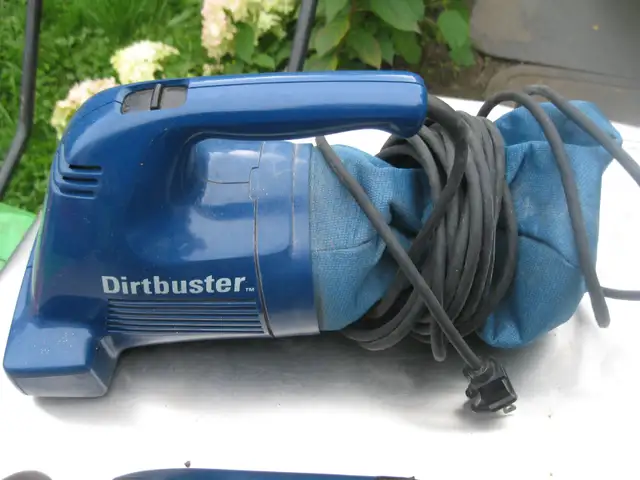 One Black & Decker DirtBuster, hand-held mini-vacuum cleaner.s