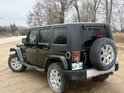 2008 jeep wrangler Sahara with leather. Comes with safety, command starts runs and drives great has...
