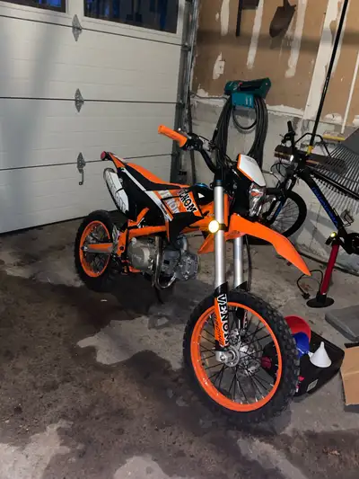 125cc pit bike. 17” front and 14” rear with 33” seat height, big enough for an adult. Motor is still...