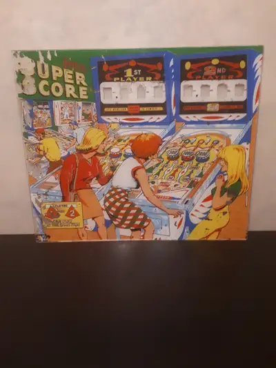 Up for sale is this iconic and original pinball machine backglass for Gottleib's Super Score Pinball...