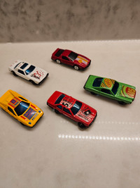 5 diecast racing toy cars, green, red, yellow, white