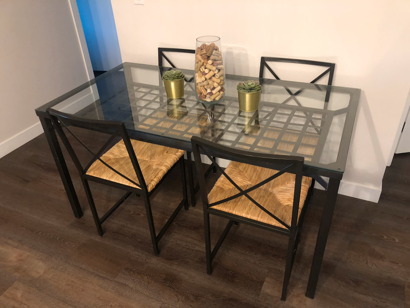 IKEA Glasstopped table and wicker chairs Dining Tables & Sets