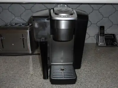 like new Keurge 1550 coffee brewer with a 92 ounce resivior with, View more