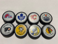  Vintage hockey pucks
