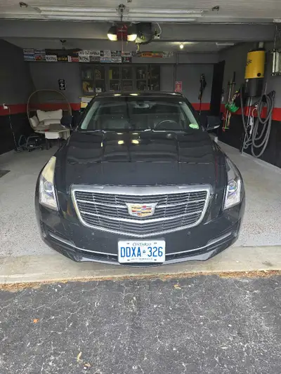 Drive in style with this sleek black Cadillac ATS sedan ALL WHEEL DRIVE WITH BLIZZAK WINTERS 90% no...