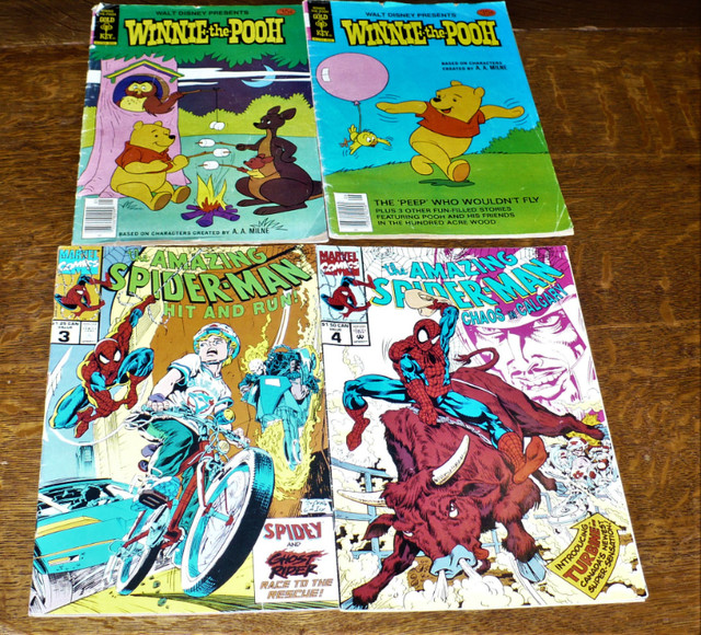 Comic Books 2 Amazing Spiderman and 2 Winnie the Pooh in Comics & Graphic Novels in St. Catharines