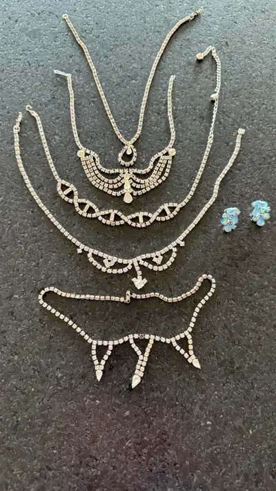 Beautiful necklaces (5) and one set of clip-on earrings by Sherman jewellery. All unsigned. All piec...