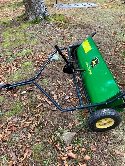 48" John Deere lawn sweeper. Works well.