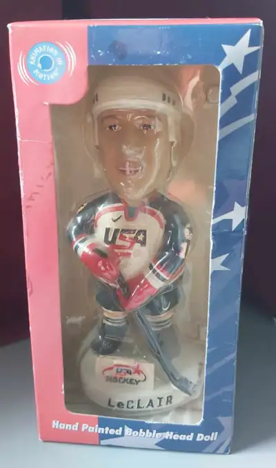 Item is still in packaging. Box has wear but the item is brand new in box. Hand painted bobble head....