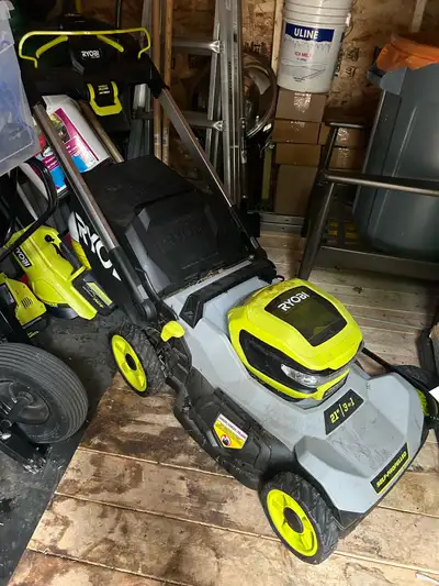 Ryobi 21” self propelled with two 6A 40 volt batteries and chargers, manual, Model RY4011014. 5 Year...