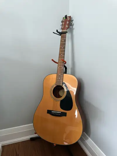 Yamaha F series acoustic guitar with accessories, View more