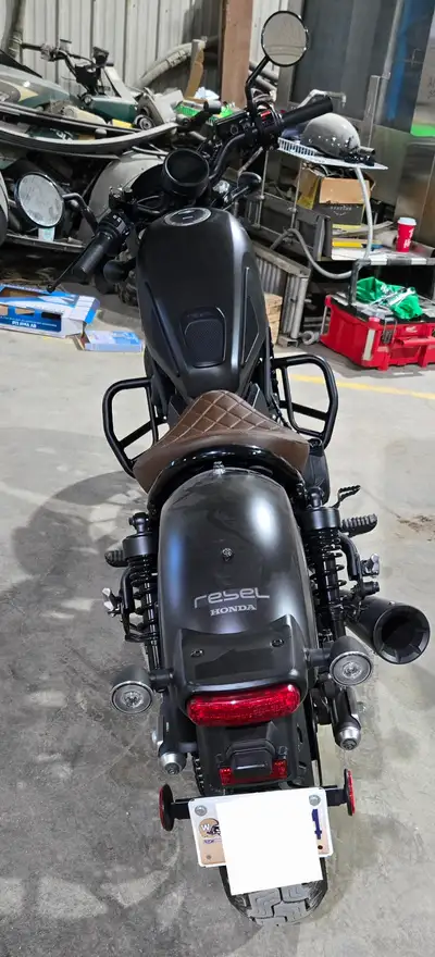 The bike has Vance & Hines exhaust, an aftermarket seat, crash bars and luggage rack. I have a wind...