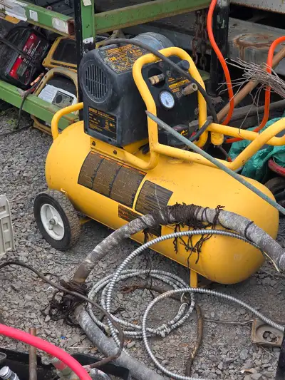 This is a used Craftsman air compressor with a portable design and a yellow tank, perfect for variou...