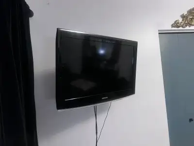 LCD 32”color TV and wall mount, View more