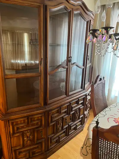 Dining room table with 4 chairs and matching hutch., View more