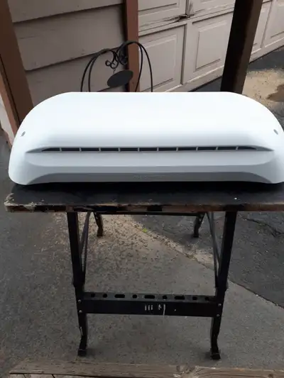 Dometic roof vent for rv/camper fridge. Comes with screen and cover. Screen has a piece missing in t...