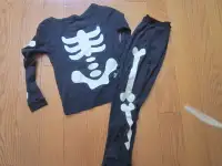 Disney size 4 skeleton PJs can be used as a halloween costume