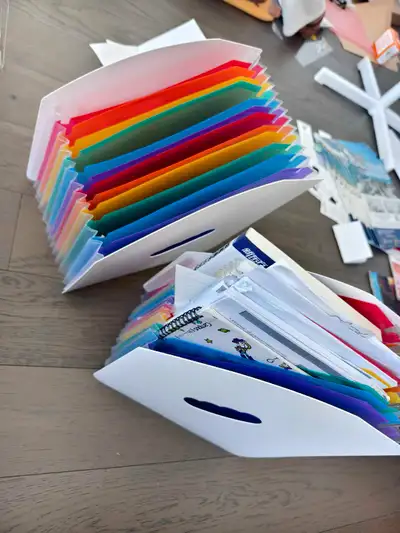 Keep your important documents neatly organized with these handy expanding file folders, perfect for...