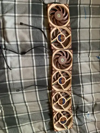 Noctua fans. Comes with the pwm female cable if you need 2 fans for an aio.