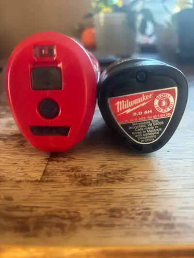 12 volt Milwaukee battery and charger , View more