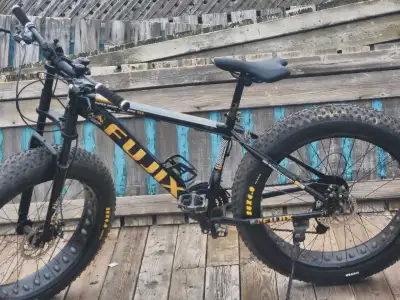 Selling a Fujix Super Sport fat bike in good, used condition with robust tires for all-terrain adven...