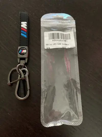 This brand new BMW M keychain is the perfect accessory for any BMW enthusiast, featuring a sleek des...