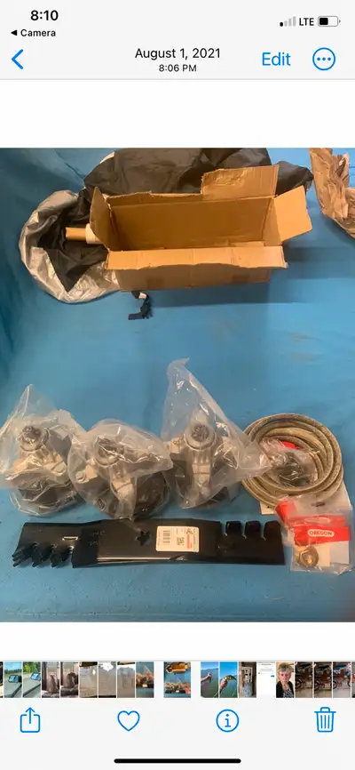 I am offering a new set of replacement parts for a lawn mower, including three spindles, a mower bla...