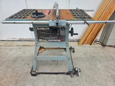 Older table saw. Is what it is. Works great. Just upgraded. Comes with wheeled carrier that locks un...