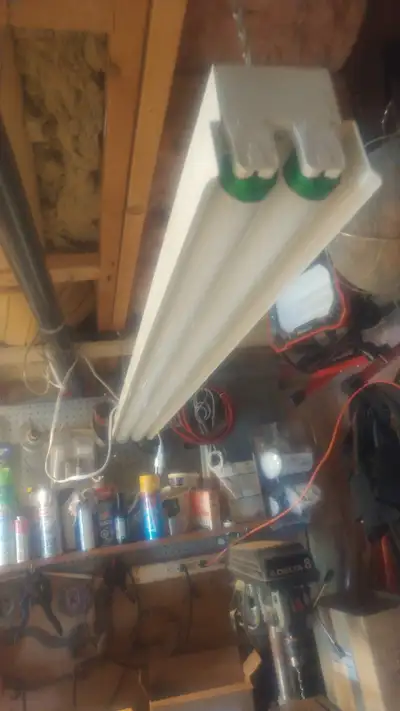 Fluorescent 4 foot shop light with new 40W bulbs, View more