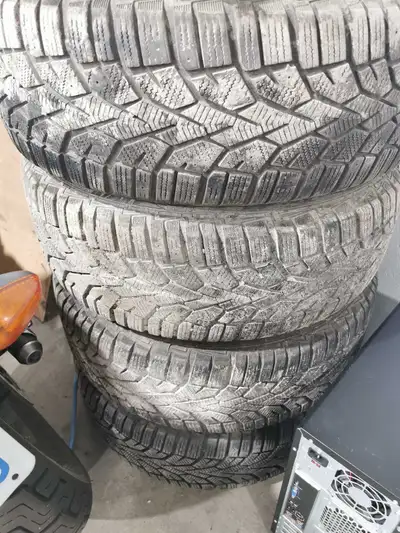 Winter tires mounted on Mazda aluminum rims 205/60R16 Stored indoors Great tread, and lots of it lef...