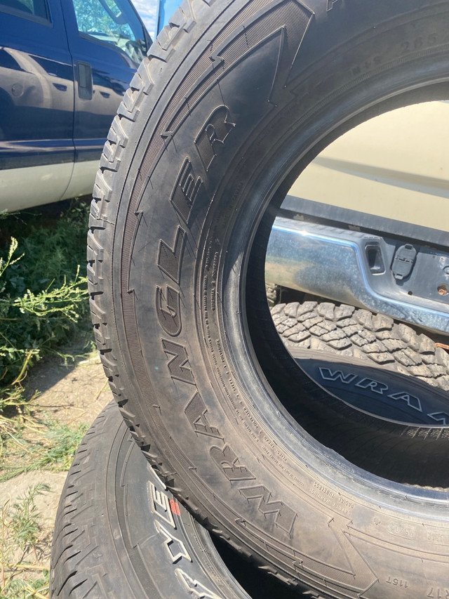 Four nearly new Goodyear Wrangler Fortitude HT 265/70R17 tires in Tires & Rims in Penticton - Image 3