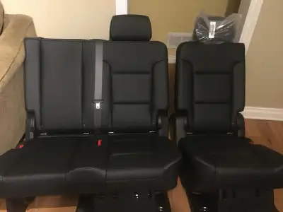 Selling a practically new set of Chevy Yukon/Tahoe second-row seats in black leather. Perfect for an...