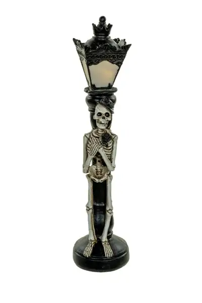 Polyresin "SKELETON LIGHT UP STREETLAMP" stands 12.5" H. Quality tested. NOTE: Batteries included BR...