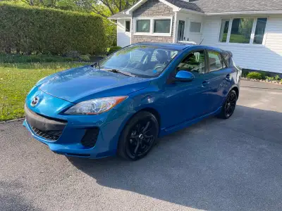 Selling my 2013 Mazda 3 GS-Sky hatchback. The car is paid off. Nothing owing. It has 198,000 KM. Ser...
