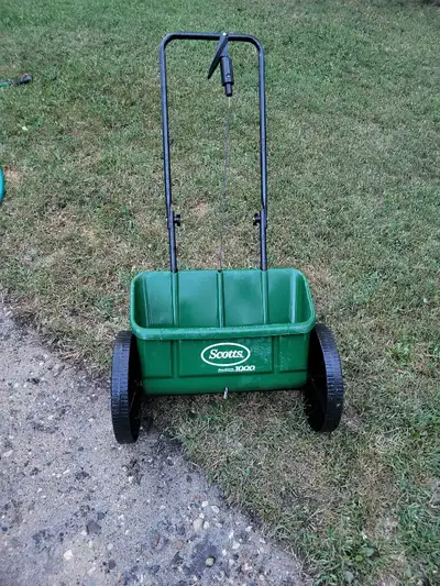 I have for sale a scotts fertilizer/grass spreader for sale. Used for one season. Can deliver to sas...