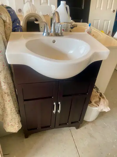 bathroom vanity space saver 24”wide 18”depth 36” height with faucet in good condition asking $120
