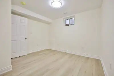 Rarely Available Legal Basement Apartment In High-Demand Williamsburg! This beautifully renovated (2...