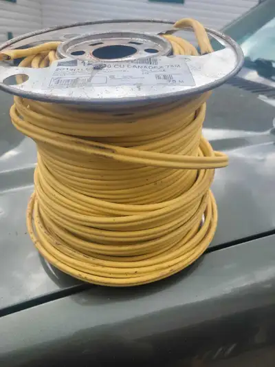 Selling a spool of new 12/2 electrical wire, approximately 75 meters in length, perfect for various...