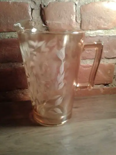 peach glass pitcher with corn flower motif, View more