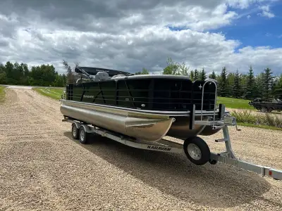2023 berkshire fishing pontoon boat. Live well, rod holders, fish finder, flip up bathroom, 250hp me...