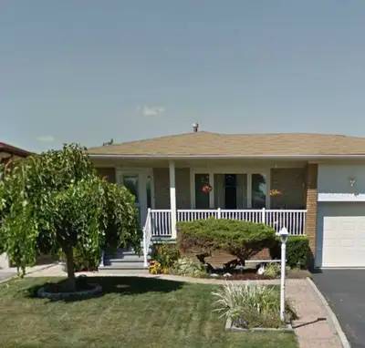 Spacious 4-bedroom bungalow featuring: 1 full bathroom and 1 half bathroom Bright kitchen Comfortabl...