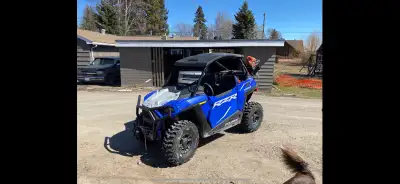 Save some money from buying this low km side by side! Original msrp $21,999, This machine fits in a...