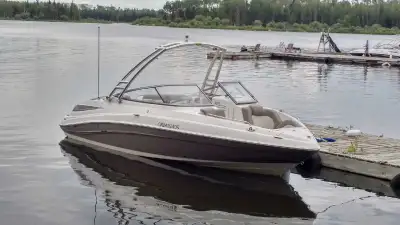 Selling a yamaha 232 jet boat In like new condition always stored in heated shop Comes with matching...