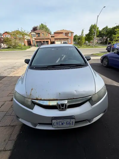 Clean car with great gas mileage, front wheel drive and generally good in the snow. New All season t...