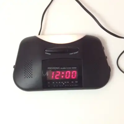 Prosonic AM/FM alarm clock radio., View more
