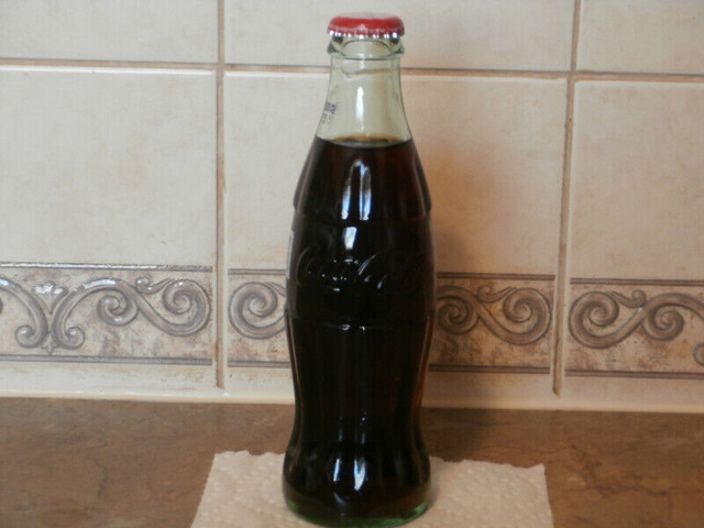 COCA COLA FULL EMBOSSED 8 OZ BOTTLE in Arts & Collectibles in St. Catharines