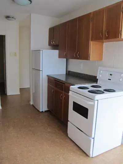 East side two bedroom apartment located in Greystone Heights. One electrified parking stall. Coin op...