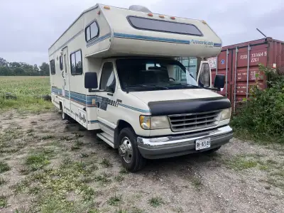 Selling class C camper van on Ford E350 chassis, manufactured by Cobra Coach Queen island bed at the...